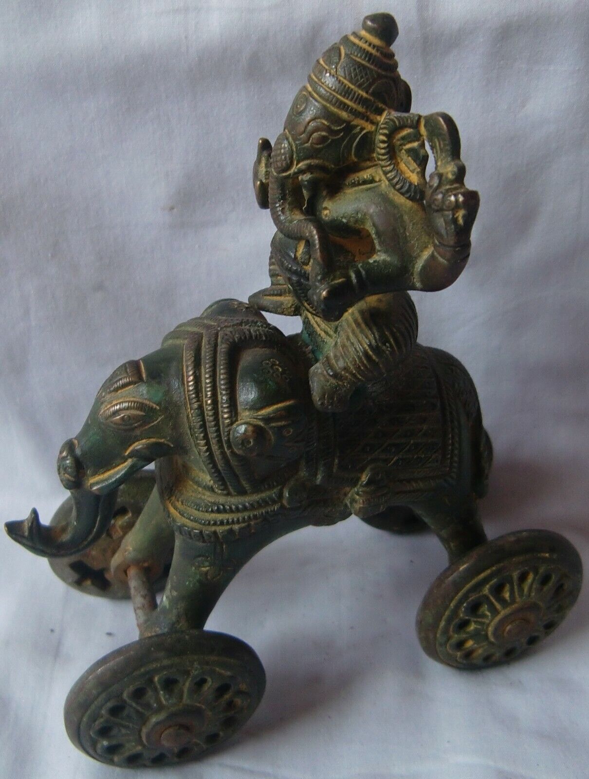 Brass lord ganesha statue on elephant animal with moving wheels rider figurine
