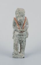 Greenlandica, old hunter with a seal on his back, sculpture in soapstone. picture